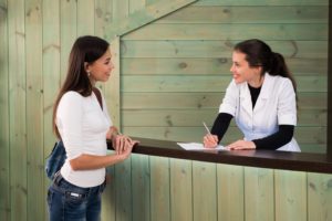 dental receptionist and patient