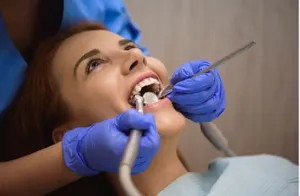 Woman getting dental exam